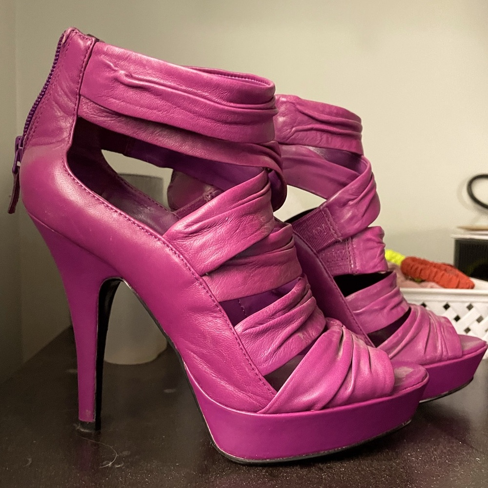 Platform style with back zipper. Worn only once or twice for special events